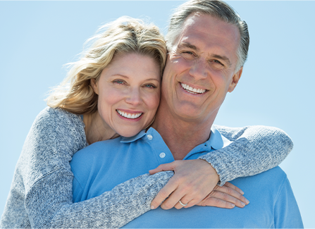 Photo of a couple smiling. Link to Life Stage Gift Planner Under Age 60 Situations.